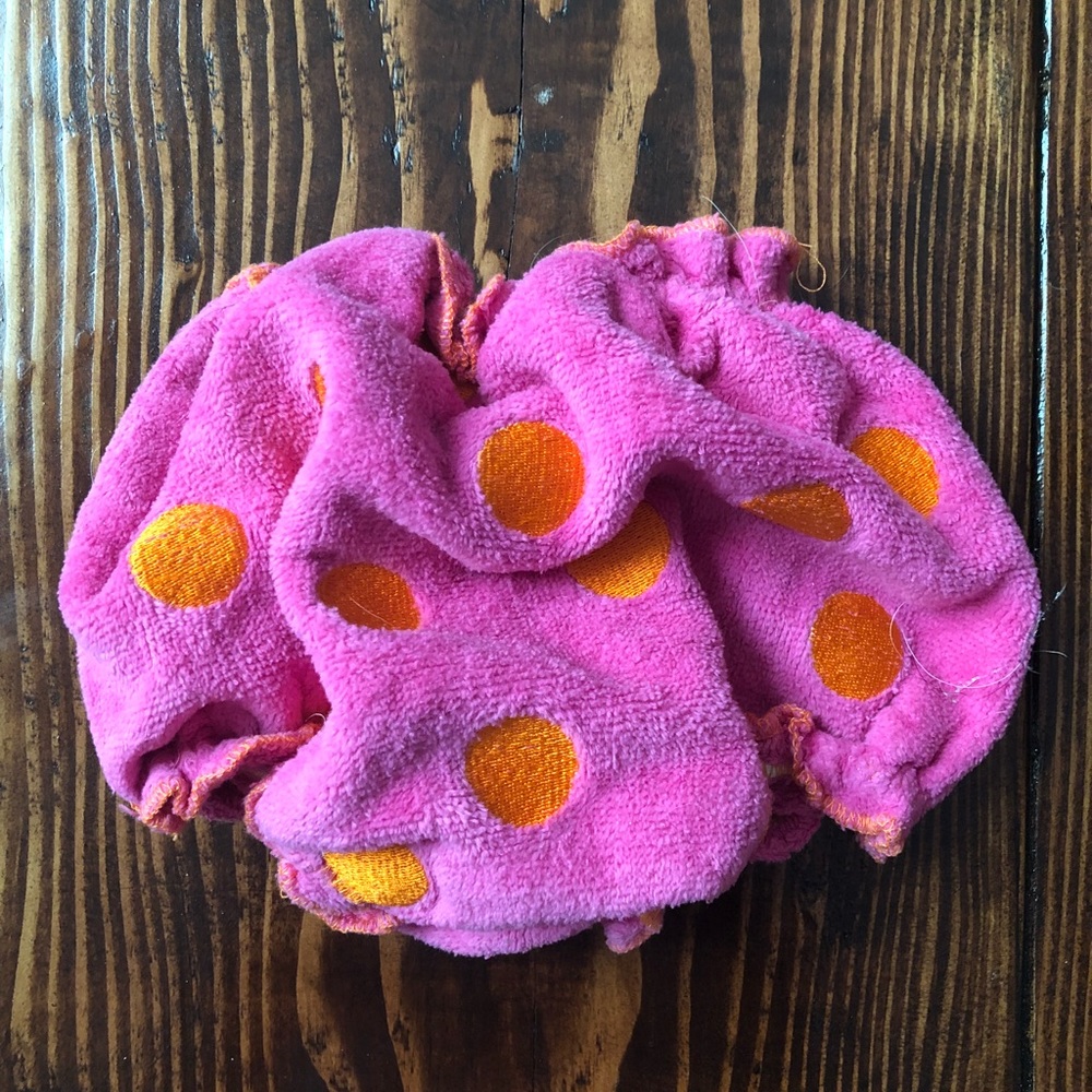 Polka dot diaper cover.